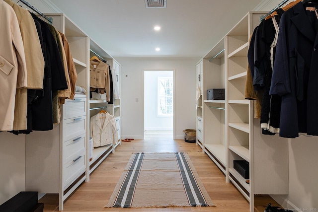 spacious closet with visible vents and light wood finished floors