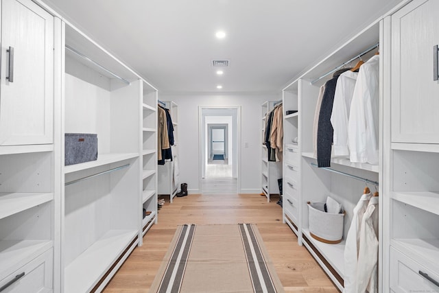 148 W Hills Rd, New Canaan, CT 06840 - walk in closet with light wood-type flooring