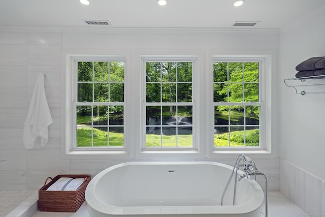 148 W Hills Rd, New Canaan, CT 06840 - bathroom featuring plenty of natural light, a soaking tub, ornamental molding, and recessed lighting