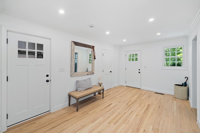 148 W Hills Rd, New Canaan, CT 06840 - foyer with light wood-style floors, recessed lighting, baseboards, and ornamental molding