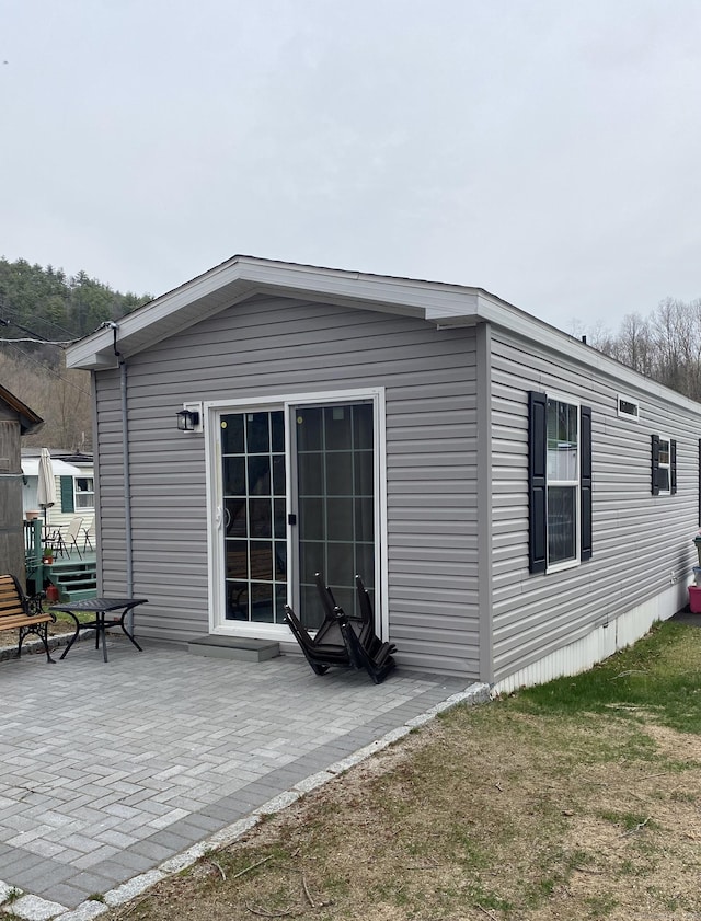 rear view of property with a patio area