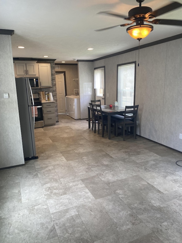 dining area with recessed lighting, ornamental molding, ceiling fan, and washing machine and clothes dryer