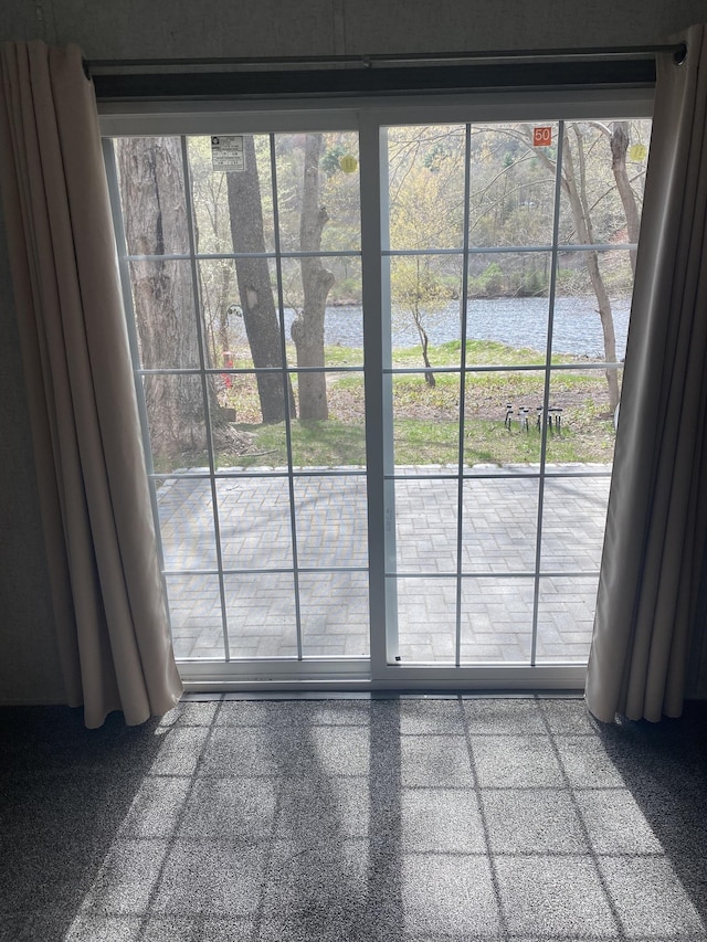 doorway with a water view