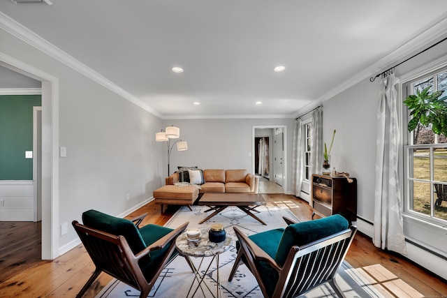 living area with light wood-style flooring, recessed lighting, and a healthy amount of sunlight