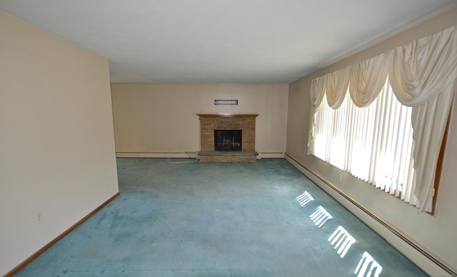 unfurnished living room featuring a baseboard heating unit, a fireplace, baseboards, carpet floors, and a baseboard radiator