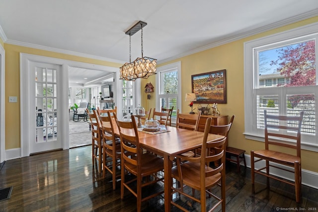 101 N Main St, Essex, CT 06426 - dining area featuring ornamental molding, a wealth of natural light, and wood finished floors