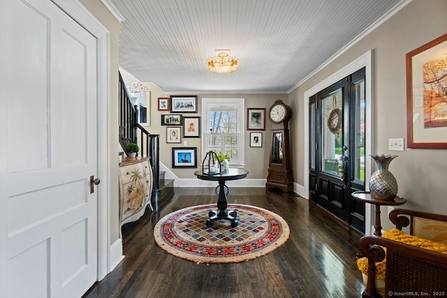 101 N Main St, Essex, CT 06426 - foyer with baseboards, ornamental molding, stairs, and dark wood-style flooring