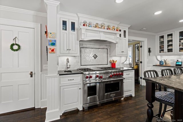 101 N Main St, Essex, CT 06426 - kitchen with range with two ovens, white cabinetry, tasteful backsplash, and dark wood finished floors