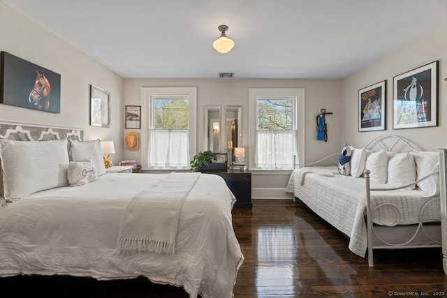 101 N Main St, Essex, CT 06426 - bedroom with dark wood-type flooring, visible vents, and baseboards