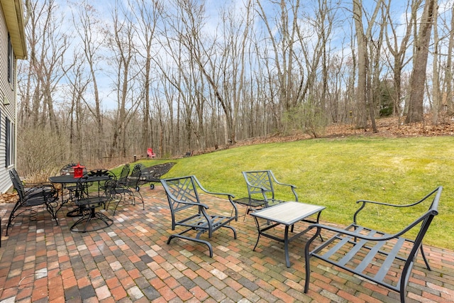 view of patio featuring outdoor dining area