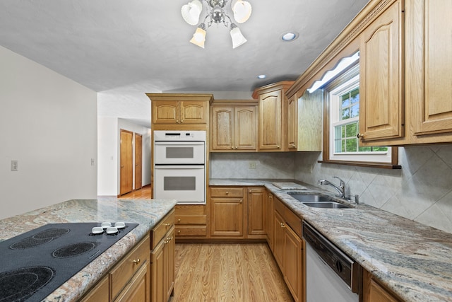 246 Sea Hill Rd, North Branford, CT 06471 - kitchen with white appliances, a sink, light stone countertops, light wood finished floors, and recessed lighting