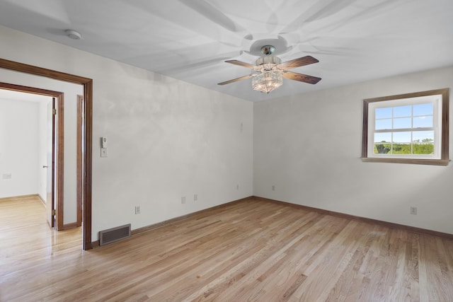 246 Sea Hill Rd, North Branford, CT 06471 - spare room featuring a ceiling fan, light wood finished floors, baseboards, and a smoke detector