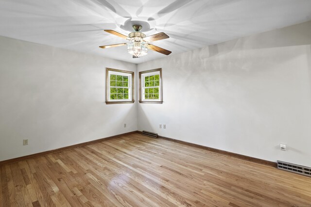 246 Sea Hill Rd, North Branford, CT 06471 - empty room with a ceiling fan, light wood finished floors, and baseboards