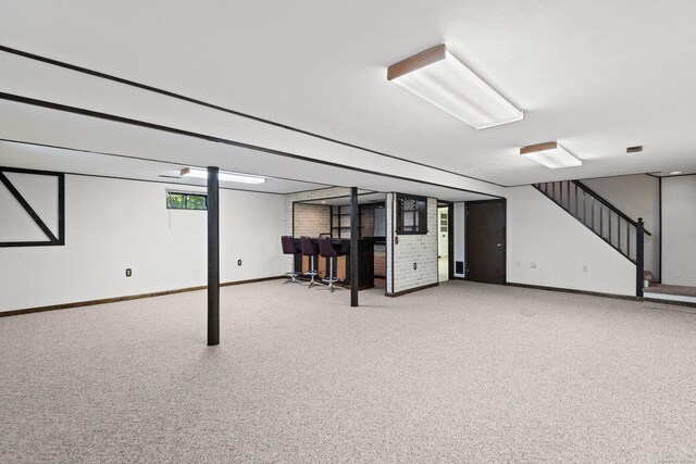 246 Sea Hill Rd, North Branford, CT 06471 - basement featuring baseboards, stairway, and carpet