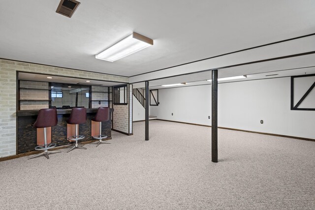 246 Sea Hill Rd, North Branford, CT 06471 - finished below grade area with a bar, carpet floors, and baseboards