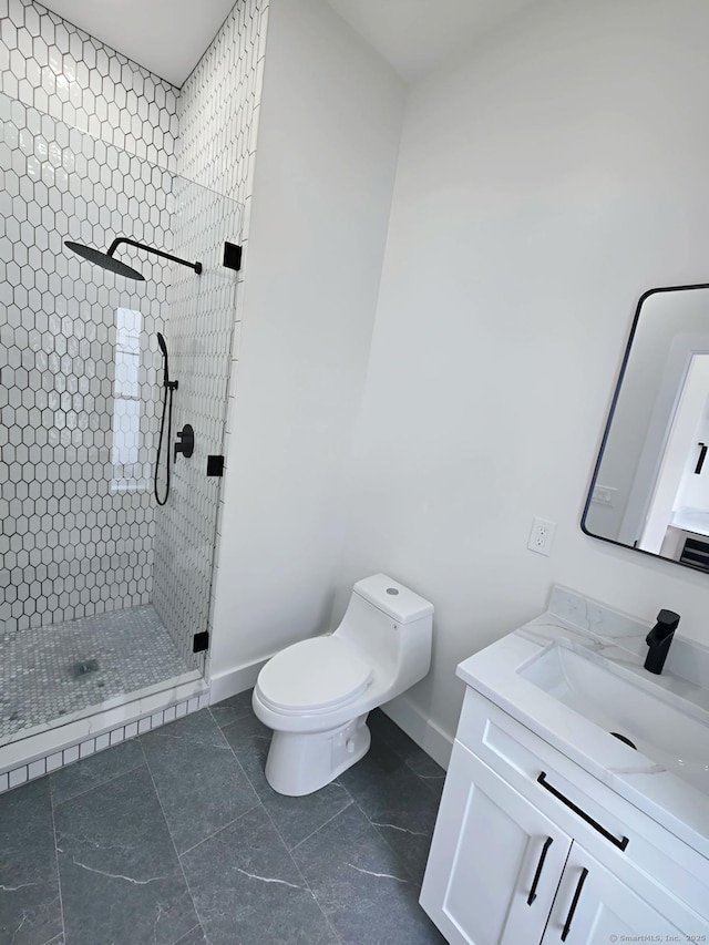 bathroom featuring a walk in shower, toilet, baseboards, and vanity