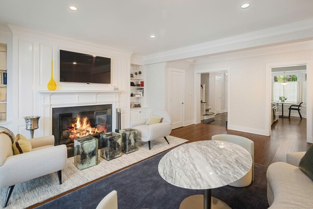 2 Mead St Unit 20, New Canaan, CT 06840 - living room featuring a glass covered fireplace, crown molding, dark wood-style floors, baseboards, and recessed lighting