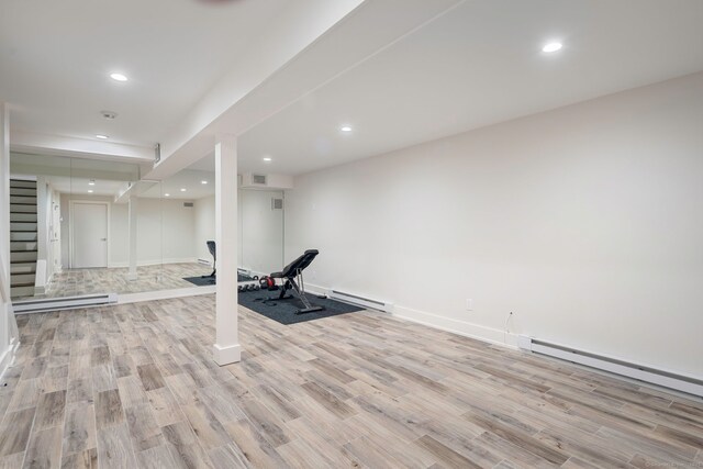 2 Mead St Unit 20, New Canaan, CT 06840 - workout area featuring a baseboard heating unit, wood finished floors, recessed lighting, and baseboards