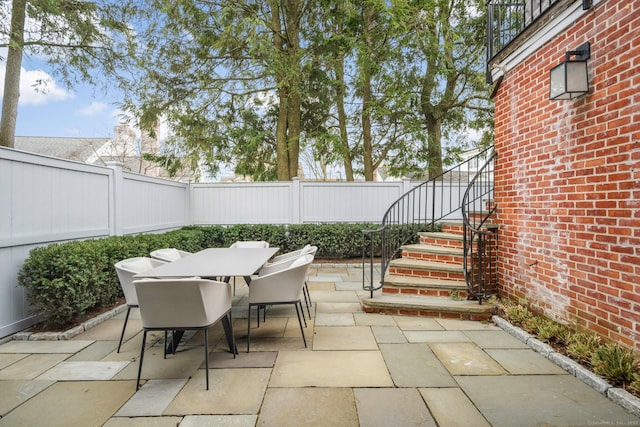 2 Mead St Unit 20, New Canaan, CT 06840 - view of patio / terrace featuring outdoor dining area and a fenced backyard