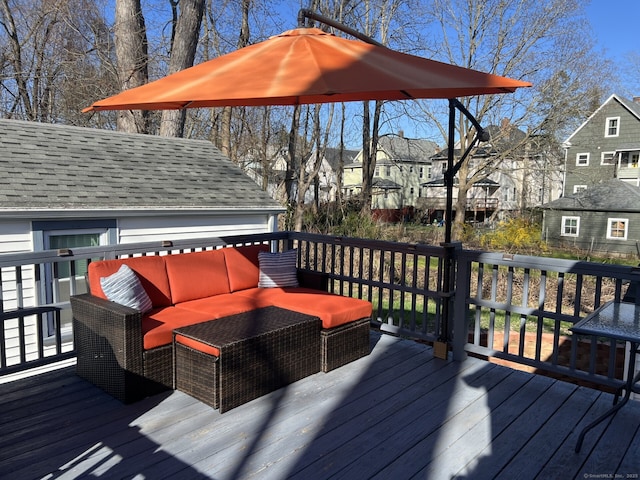 deck with an outdoor hangout area and a residential view