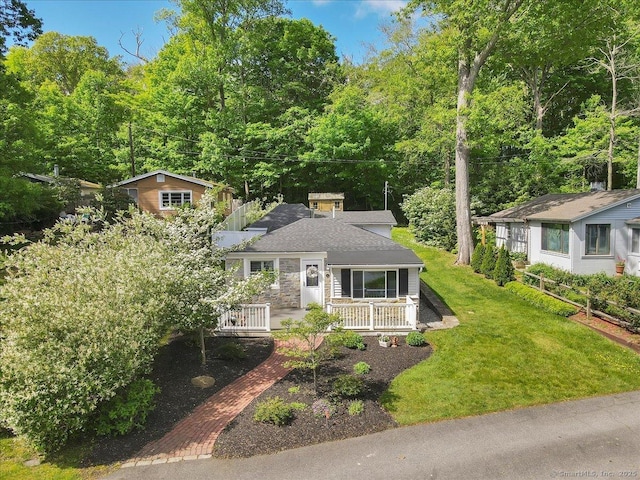 538 Winthrop Rd Unit 5, Deep River, CT 06417 - view of front of home with a front lawn, roof with shingles, and covered porch