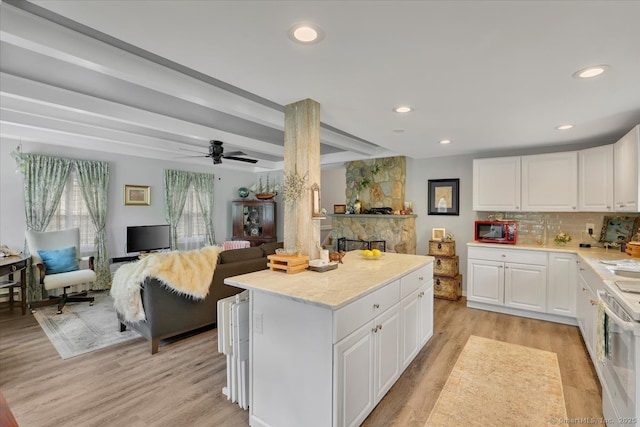 538 Winthrop Rd Unit 5, Deep River, CT 06417 - kitchen featuring open floor plan, white cabinetry, light wood-style flooring, backsplash, and recessed lighting