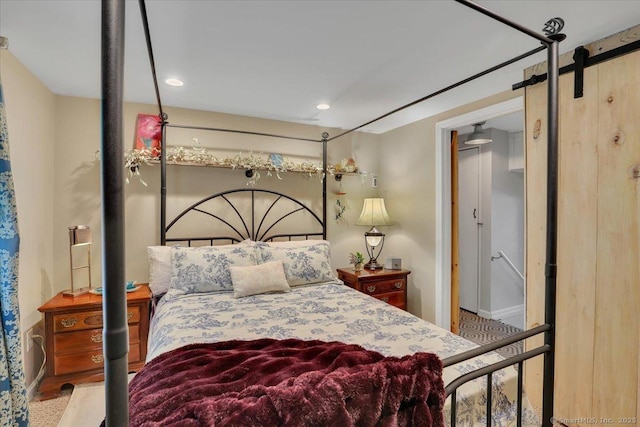 538 Winthrop Rd Unit 5, Deep River, CT 06417 - bedroom featuring a barn door, baseboards, and recessed lighting