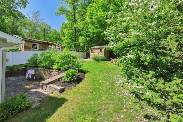 538 Winthrop Rd Unit 5, Deep River, CT 06417 - view of yard featuring a patio area and a storage unit