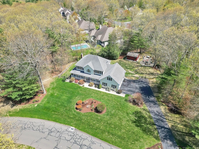 drone / aerial view with a view of trees