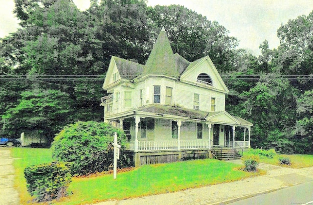126 Howe Ave, Shelton, CT 06484 - victorian house featuring covered porch and a front yard