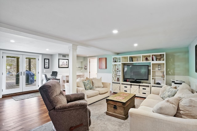 2 Goodhill Rd, New Milford, CT 06776 - living room featuring french doors, a wainscoted wall, recessed lighting, decorative columns, and wood finished floors