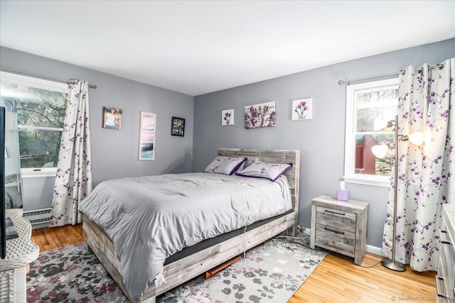 bedroom with wood finished floors