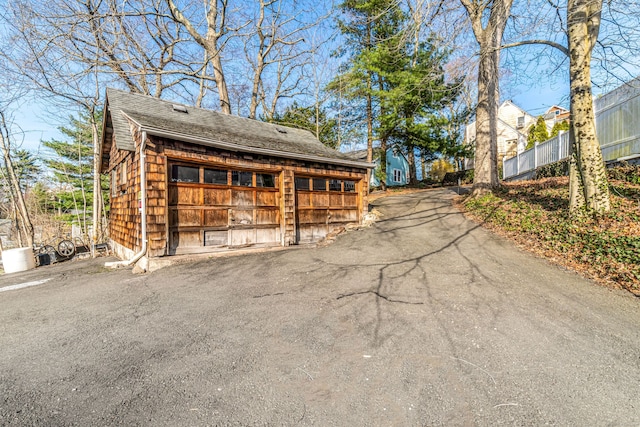garage featuring fence