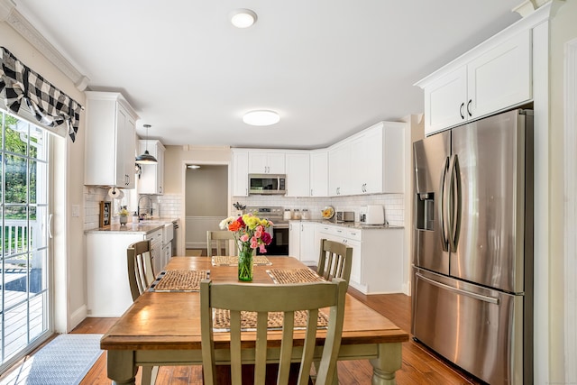 dining area featuring wood finished floors