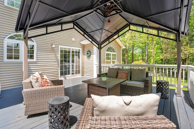 deck featuring outdoor lounge area