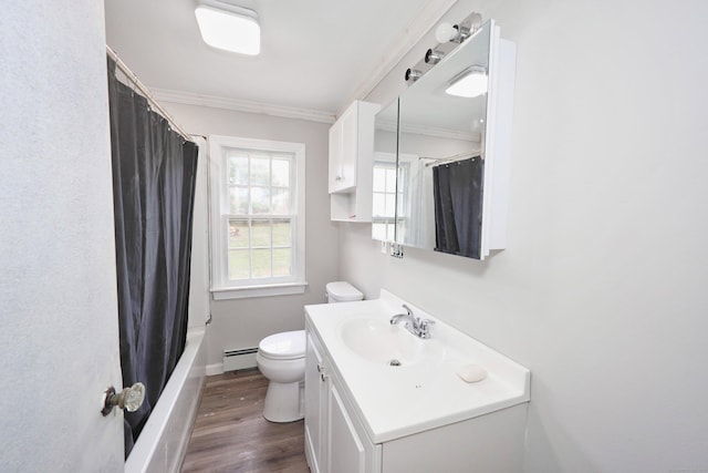 full bathroom with a baseboard heating unit, vanity, toilet, ornamental molding, and wood finished floors