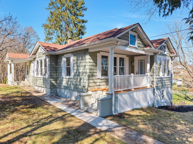 34 Power House Rd, Montville, CT 06382 - bungalow-style home featuring a porch and a front lawn