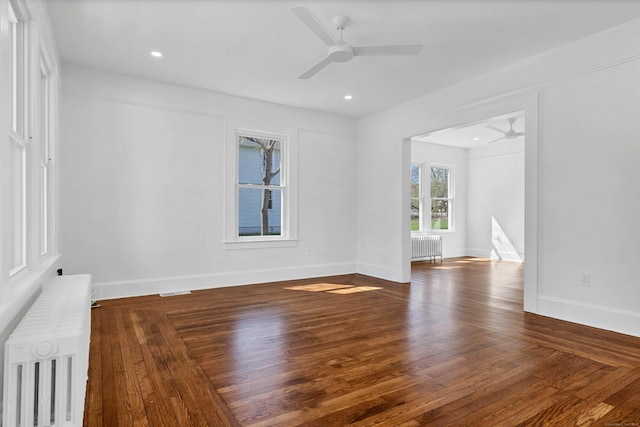 34 Power House Rd, Montville, CT 06382 - spare room featuring radiator heating unit, wood finished floors, baseboards, and ceiling fan