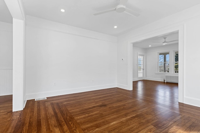 34 Power House Rd, Montville, CT 06382 - spare room featuring radiator, baseboards, visible vents, wood finished floors, and ceiling fan