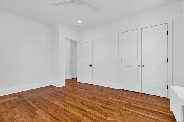 34 Power House Rd, Montville, CT 06382 - unfurnished bedroom with baseboards, a ceiling fan, wood finished floors, and a closet