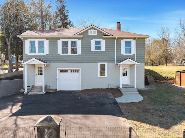 34 Power House Rd, Montville, CT 06382 - view of front of house with a garage, a chimney, and fence