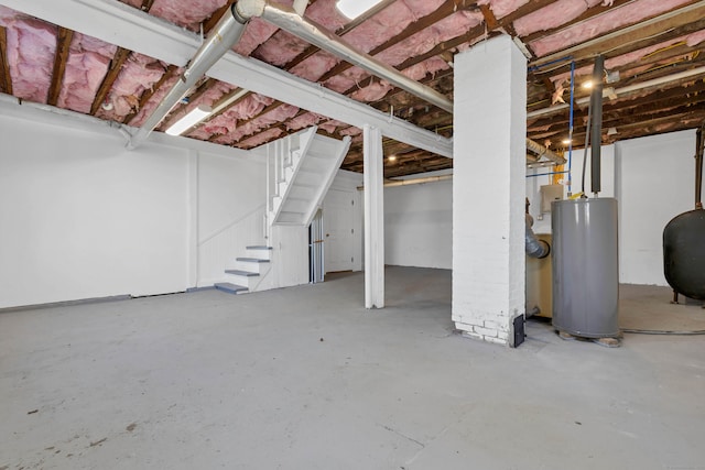 34 Power House Rd, Montville, CT 06382 - unfinished below grade area with water heater, stairs, and heating fuel