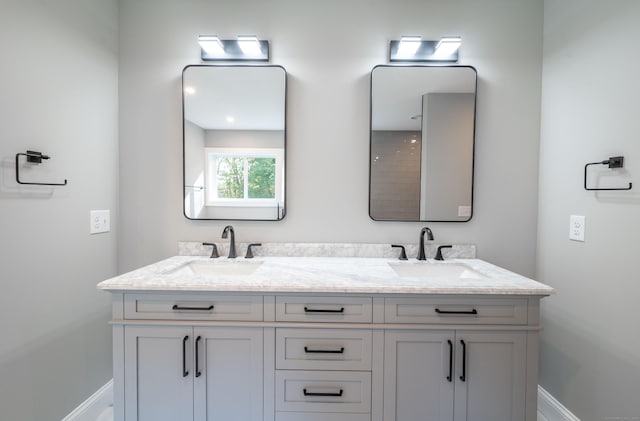 43 Moose Hill Rd, Trumbull, CT 06611 - full bath featuring double vanity and baseboards