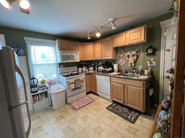 21-23 Elm St, Derby, CT 06418 - kitchen featuring dark countertops, a sink, and white appliances