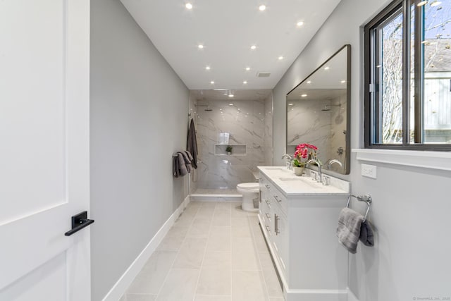 bathroom featuring recessed lighting, visible vents, toilet, and a marble finish shower
