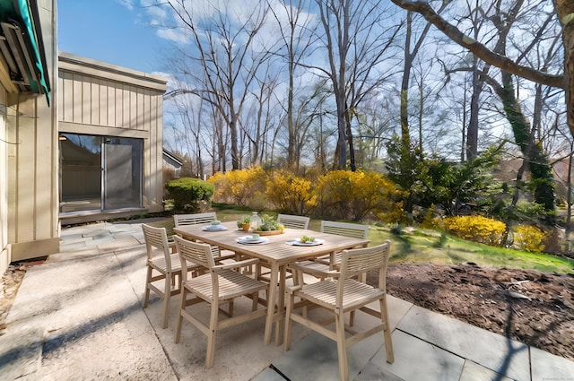 view of patio featuring outdoor dining area