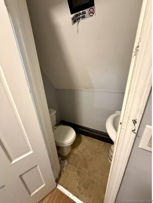 bathroom featuring toilet