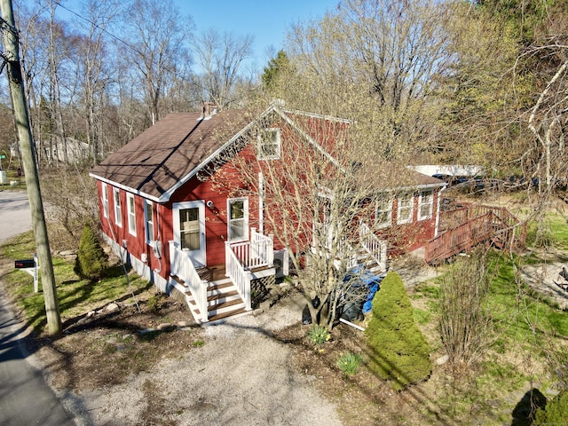 view of front of property with a shingled roof