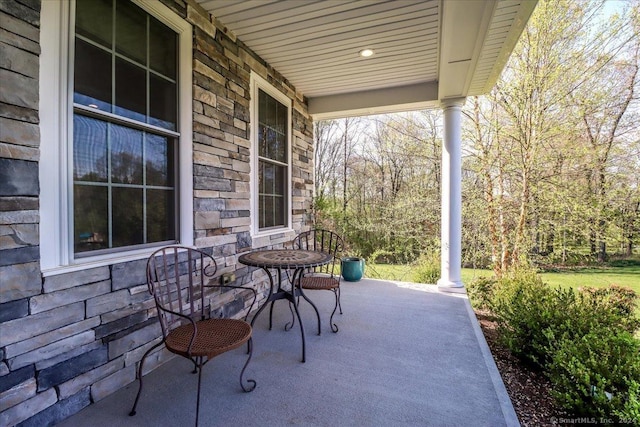 view of patio featuring a porch