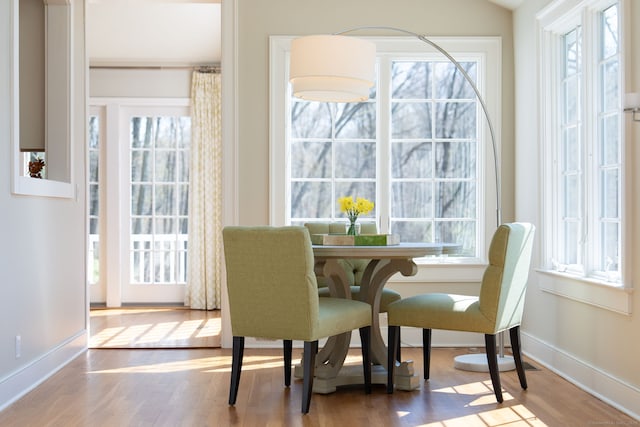 6 Wahackme Ln, New Canaan, CT 06840 - dining room with a healthy amount of sunlight, baseboards, and wood finished floors